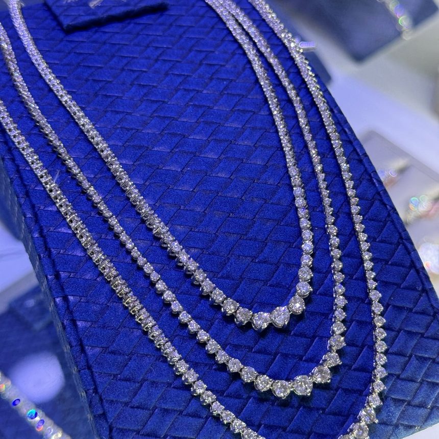 Graduated diamond tennis necklaces